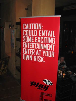 Play 99.6 banner at Blue Fig launch event