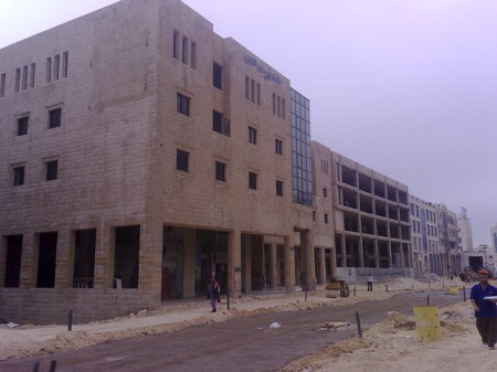 The signs are gone from this building in Suweifieh