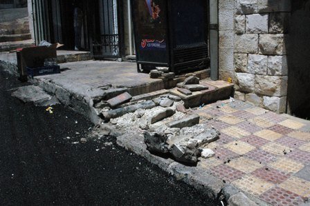 Destroyed sidewalk in Amman