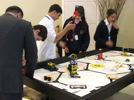 Jubilee School kids working with robotic kits