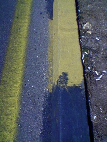 Yellow and back Jordanian curbstones