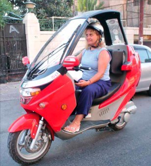 Miss Haya on a scooter